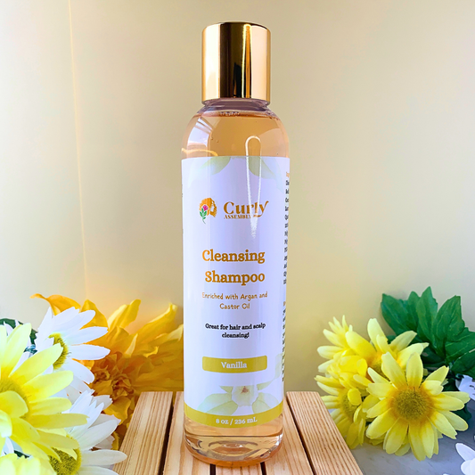 Front-facing bottle of Curly Assembly Sweet Vanilla Shampoo, formulated to gently cleanse while maintaining moisture in natural curls.