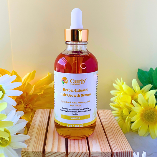 Front-facing bottle of Curly Assembly Sweet Vanilla Herbal-Infused Hair Growth Serum posed with a floral background, designed to promote healthy hair growth, strengthen hair follicles, and provide a delightful sweet vanilla scent.