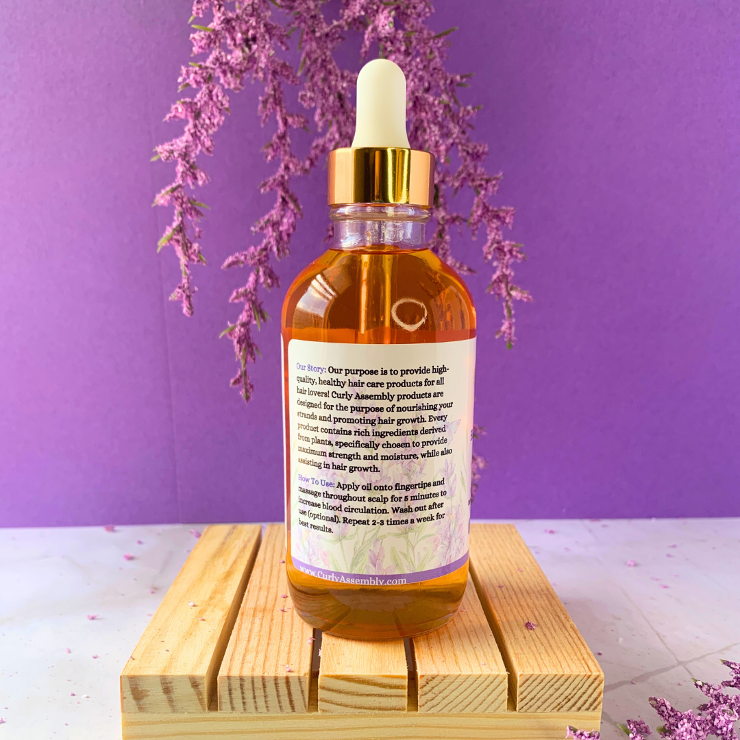 Side view of Curly Assembly Lavender Bliss Herbal-Infused Hair Growth Serum showcasing its nourishing herbal ingredients.