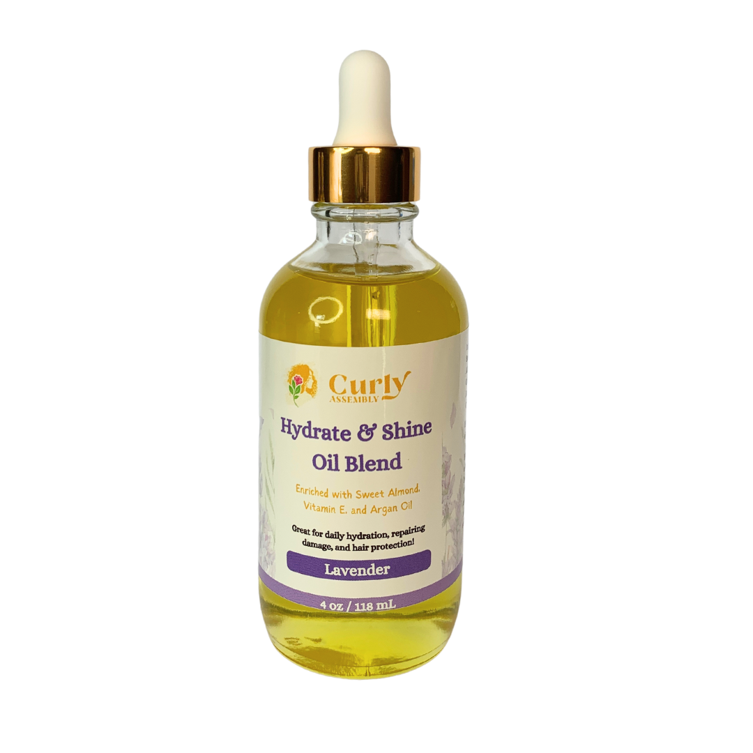 Front-facing bottle of Curly Assembly Lavender Bliss Hydrate & Shine Oil Blend for instant moisture and shine for natural curls.